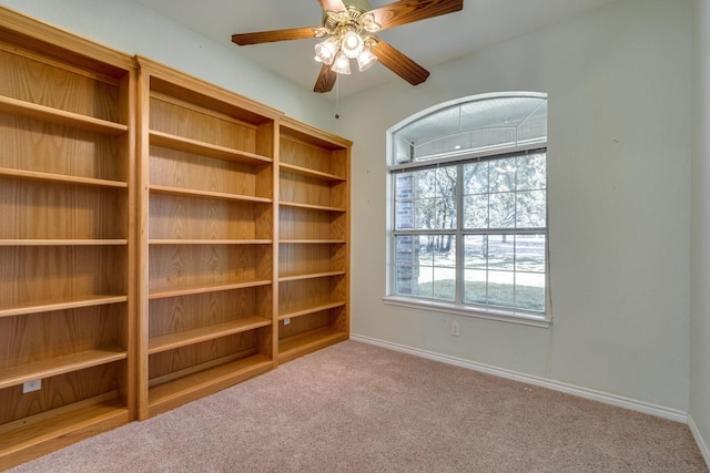 6424 County Road 176, Stephenville, TX 76401 - carpeted empty room with a ceiling fan and baseboards