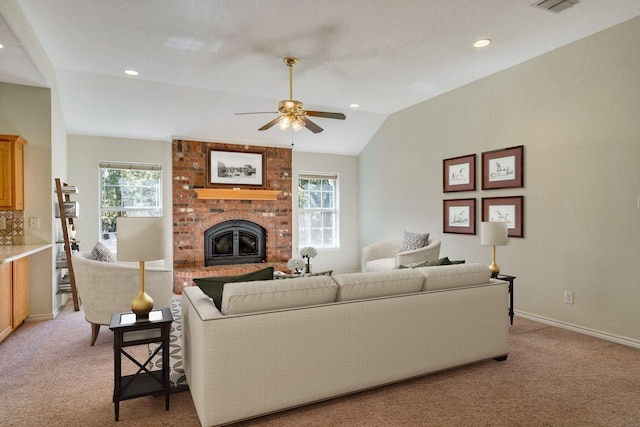 6424 County Road 176, Stephenville, TX 76401 - living room featuring light colored carpet, a wealth of natural light, and a fireplace