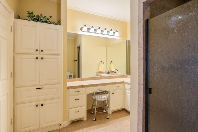full bathroom with a shower stall, tile patterned floors, vanity, and ornamental molding