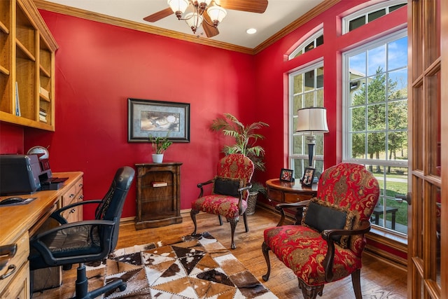 home office with baseboards, wood finished floors, ceiling fan, and ornamental molding