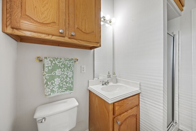 560 Glenn Ln, Red Oak, TX 75154 - full bathroom featuring a stall shower, vanity, and toilet