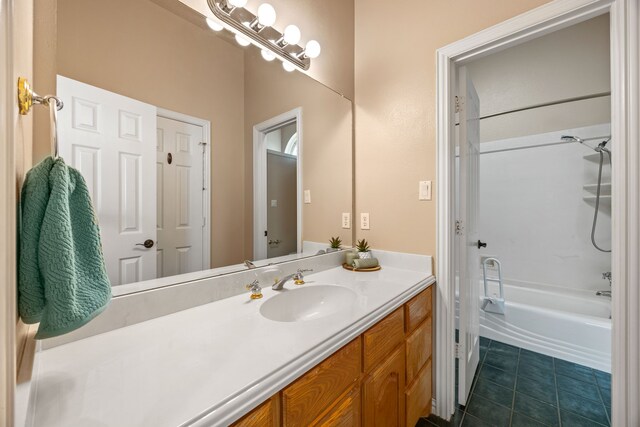 560 Glenn Ln, Red Oak, TX 75154 - bathroom featuring shower / bathtub combination, tile patterned floors, and vanity