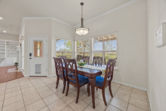 560 Glenn Ln, Red Oak, TX 75154 - dining space with crown molding, baseboards, light tile patterned floors, and recessed lighting