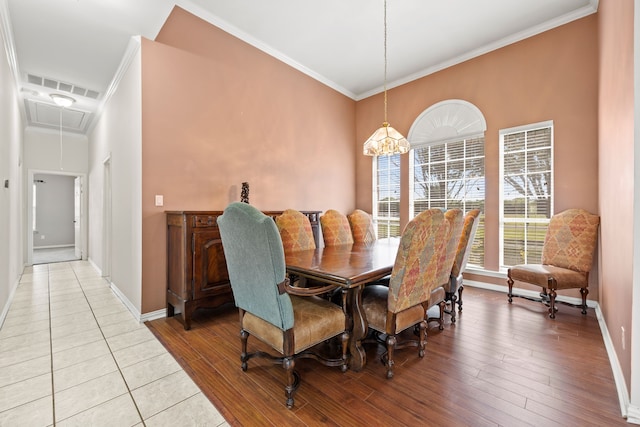 560 Glenn Ln, Red Oak, TX 75154 - dining space featuring crown molding, attic access, baseboards, and visible vents