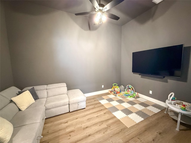 3810 Braxton Dr, Melissa, TX 75454 - living room with baseboards, wood finished floors, and a ceiling fan