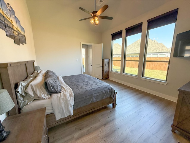 3810 Braxton Dr, Melissa, TX 75454 - bedroom with wood finished floors, baseboards, ceiling fan, and lofted ceiling