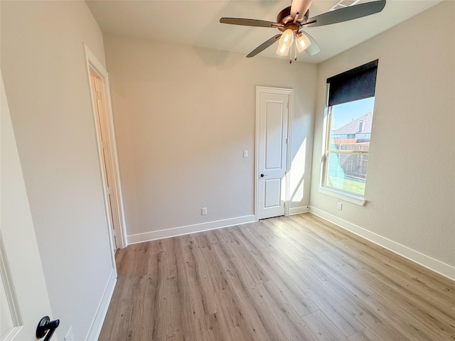 3810 Braxton Dr, Melissa, TX 75454 - empty room with light wood-style floors, ceiling fan, and baseboards