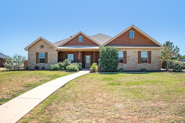 249 Winchester St, Tuscola, TX 79562 - craftsman house with stone siding, a front lawn, and metal roof