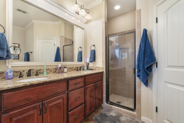 249 Winchester St, Tuscola, TX 79562 - bathroom featuring double vanity, a sink, visible vents, and a stall shower