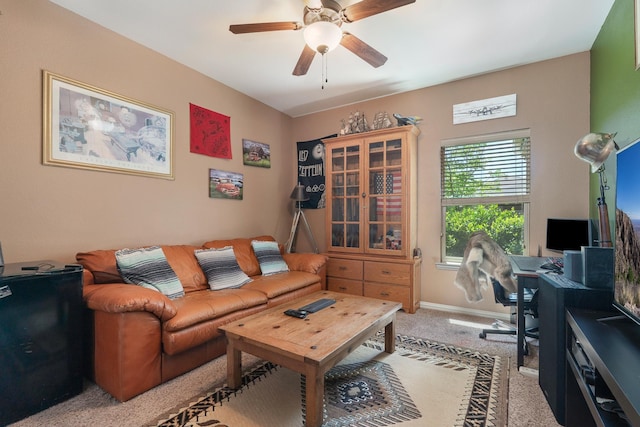 249 Winchester St, Tuscola, TX 79562 - living room with light colored carpet, baseboards, and a ceiling fan