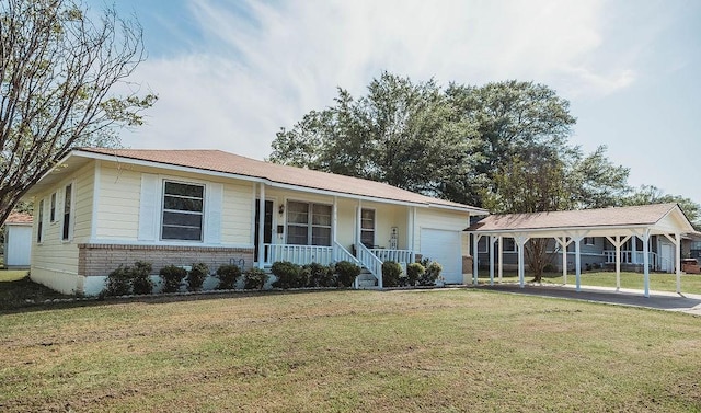 ranch-style home featuring brick siding, a garage, a front yard, and covered porch