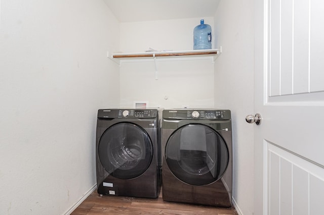 413 Everglades St, Princeton, TX 75407 - laundry area featuring baseboards, separate washer and dryer, laundry area, and wood finished floors