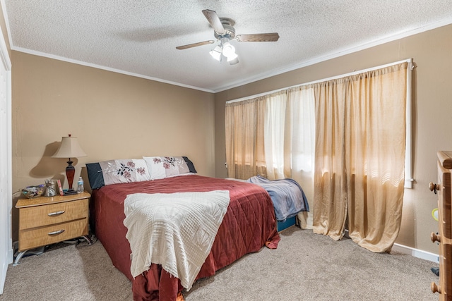 carpeted bedroom with ceiling fan, baseboards, a textured ceiling, and ornamental molding