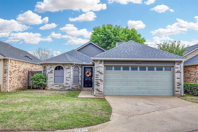 ranch-style house with fence, a front yard, a shingled roof, concrete driveway, and an attached garage