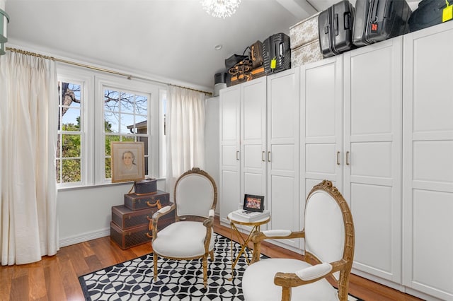 living area featuring wood finished floors and baseboards