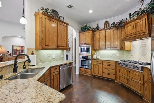 114 Deer Crossing Way, Azle, TX 76020 - kitchen featuring stainless steel dishwasher, a peninsula, brown cabinetry, backsplash, and light stone countertops