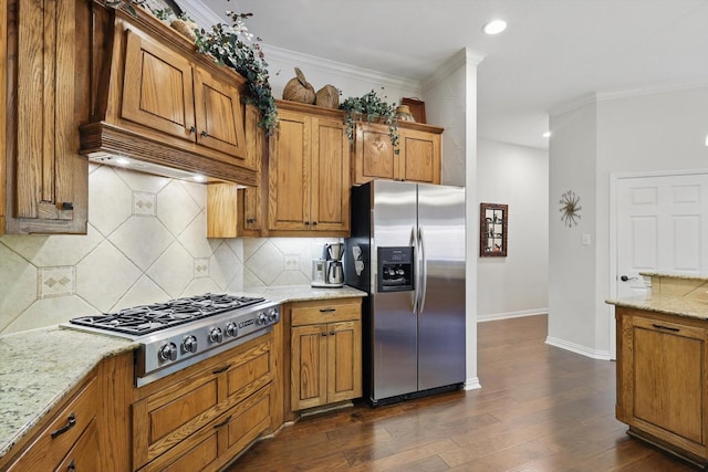 114 Deer Crossing Way, Azle, TX 76020 - kitchen with appliances with stainless steel finishes, brown cabinets, light stone counters, crown molding, and tasteful backsplash