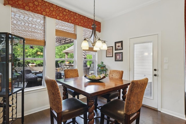114 Deer Crossing Way, Azle, TX 76020 - dining area with crown molding, baseboards, dark wood-type flooring, and a chandelier