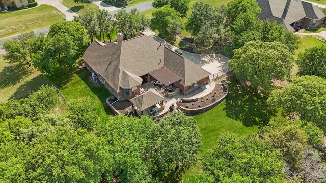 114 Deer Crossing Way, Azle, TX 76020 - view of patio featuring a storage shed and view of wooded area