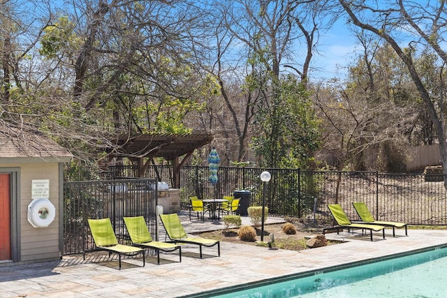 9910 Royal Ln Unit 1402, Dallas, TX 75231 - view of swimming pool featuring a patio area and a pergola
