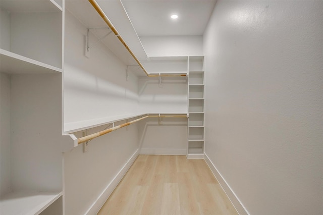 2229 Varsity Dr, Grand Prairie, TX 75051 - walk in closet with light wood finished floors