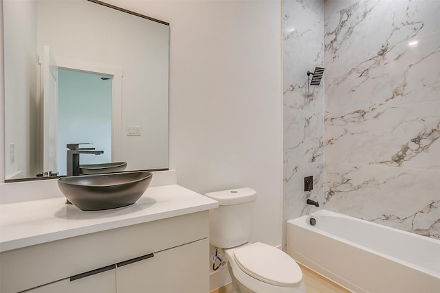 2229 Varsity Dr, Grand Prairie, TX 75051 - bathroom with vanity, washtub / shower combination, and toilet