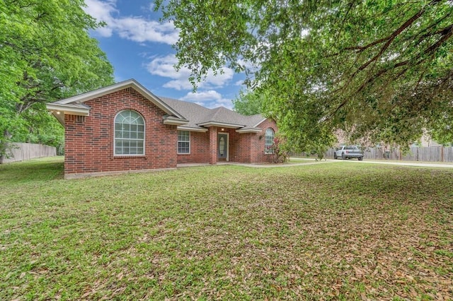 2618 S 2nd St, Waco, TX 76706 - ranch-style home featuring fence, brick siding, and a front yard