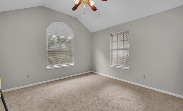 2618 S 2nd St, Waco, TX 76706 - empty room featuring ceiling fan, lofted ceiling, carpet floors, and baseboards