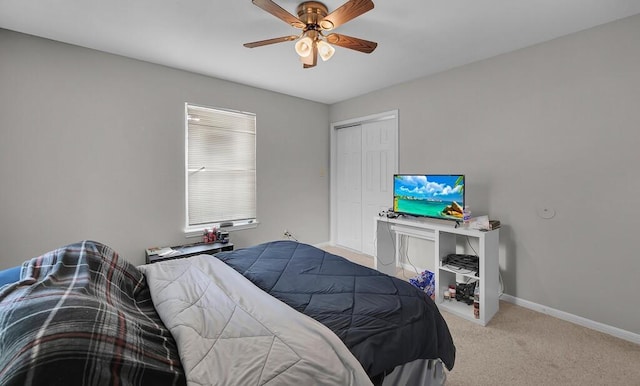 2618 S 2nd St, Waco, TX 76706 - bedroom with a closet, carpet flooring, baseboards, and ceiling fan