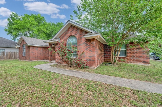 2618 S 2nd St, Waco, TX 76706 - single story home with fence, brick siding, and a front yard