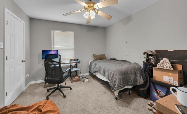 2618 S 2nd St, Waco, TX 76706 - bedroom with baseboards, carpet, and ceiling fan