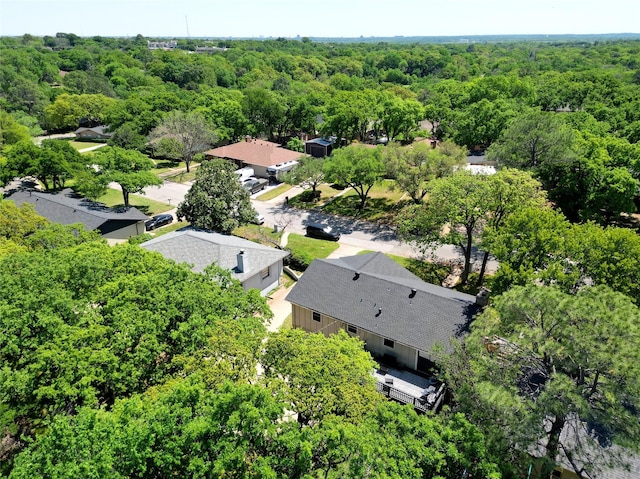 aerial view with a wooded view