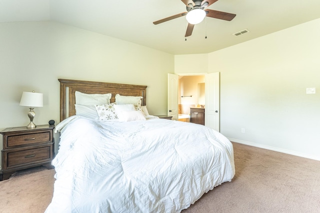 carpeted bedroom with baseboards, vaulted ceiling, visible vents, and ceiling fan