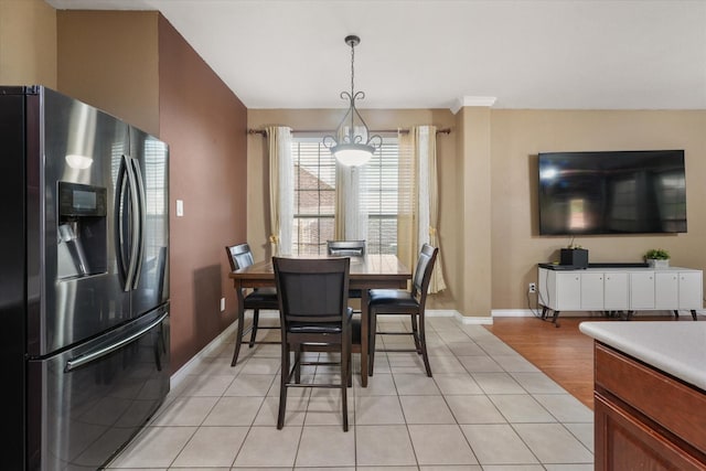 1603 Willow Ln, Cedar Hill, TX 75104 - dining room with light tile patterned floors and baseboards