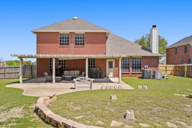 1603 Willow Ln, Cedar Hill, TX 75104 - back of house featuring a patio, an outdoor hangout area, a lawn, brick siding, and a fenced backyard