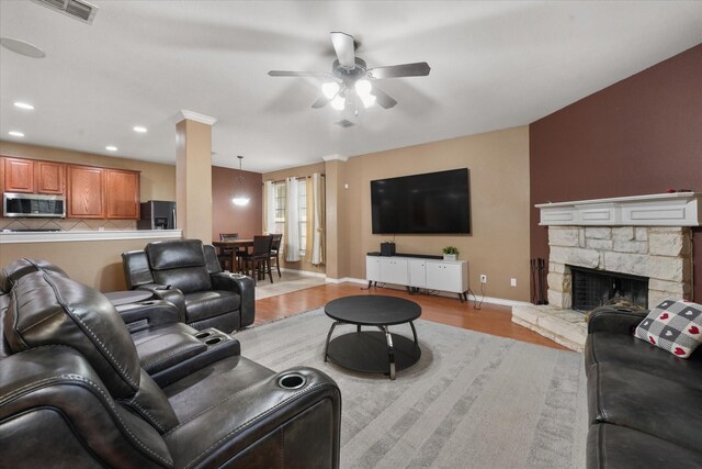 1603 Willow Ln, Cedar Hill, TX 75104 - living room featuring light wood-type flooring, visible vents, a ceiling fan, and baseboards