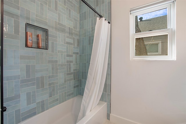 full bath with shower / tub combo with curtain