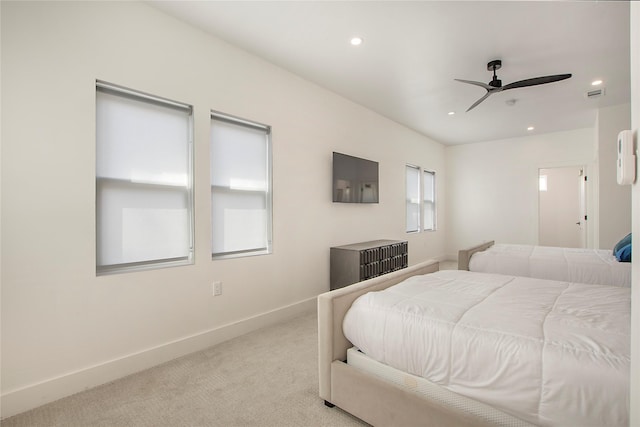bedroom featuring recessed lighting, baseboards, a ceiling fan, and light colored carpet