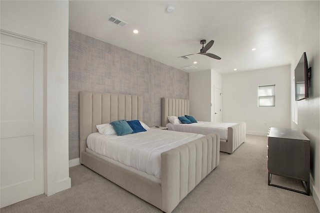 bedroom featuring light colored carpet, baseboards, visible vents, and recessed lighting