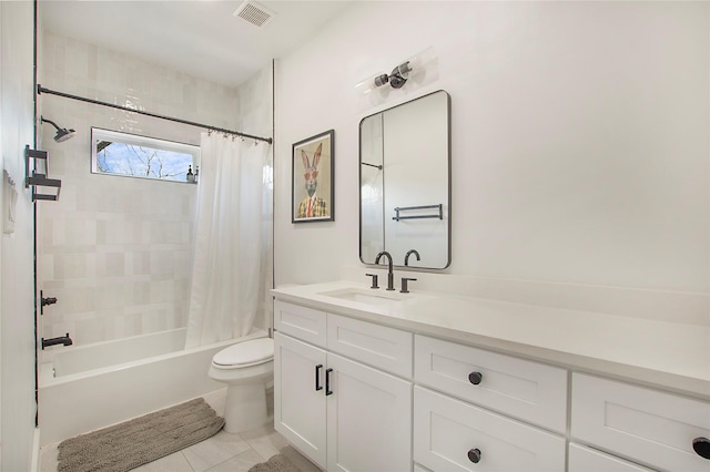 bathroom featuring toilet, visible vents, tile patterned flooring, shower / bathtub combination with curtain, and vanity