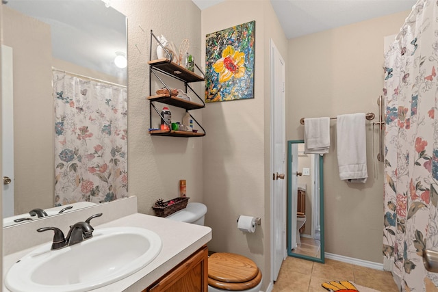 full bath with tile patterned floors, vanity, a shower with curtain, baseboards, and toilet