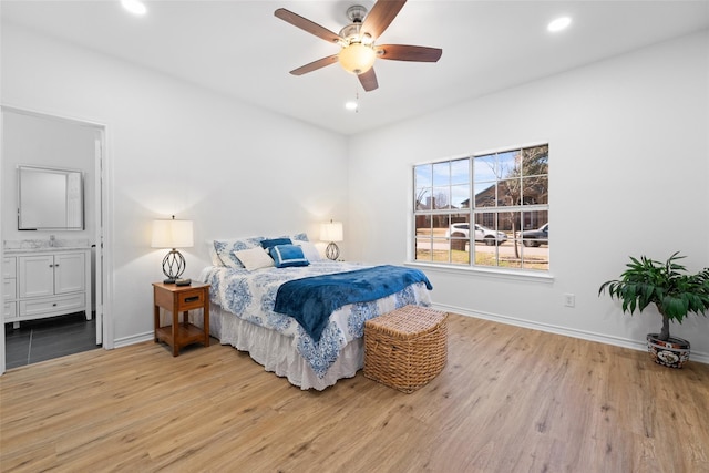 7022 Cottonwood Cir, Sachse, TX 75048 - bedroom with baseboards, wood finished floors, and recessed lighting