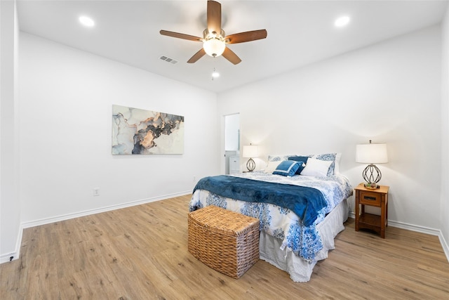7022 Cottonwood Cir, Sachse, TX 75048 - bedroom featuring recessed lighting, wood finished floors, visible vents, and baseboards