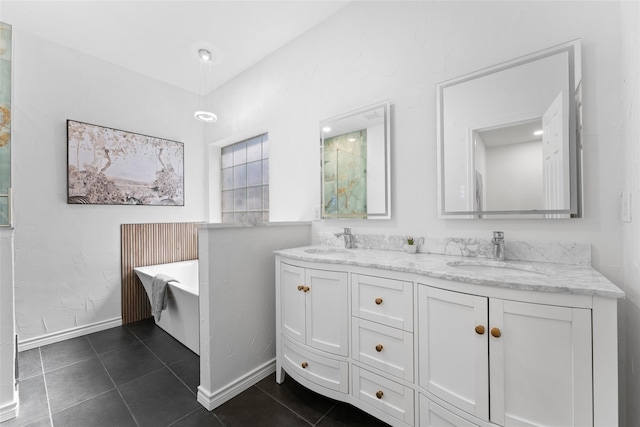 7022 Cottonwood Cir, Sachse, TX 75048 - bathroom featuring a freestanding bath, tile patterned floors, a sink, and double vanity