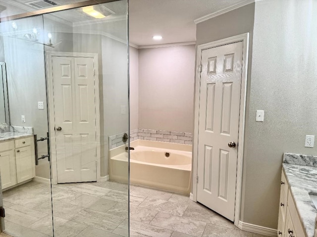 bathroom with a bath, baseboards, vanity, and ornamental molding