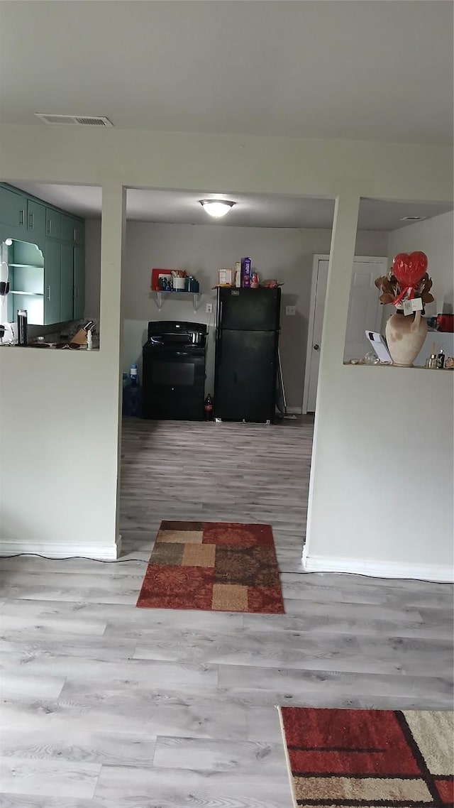 401 N Smith Ave, Dawson, TX 76639 - hall featuring baseboards and wood finished floors