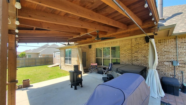 view of patio / terrace featuring a fenced backyard and ceiling fan