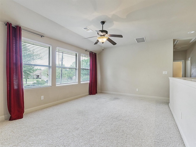 2500 Fountain Cv, Carrollton, TX 75006 - spare room featuring visible vents, attic access, baseboards, and carpet flooring