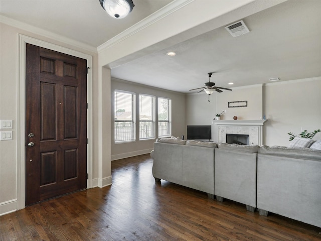 2500 Fountain Cv, Carrollton, TX 75006 - living area with a ceiling fan, baseboards, dark wood-type flooring, visible vents, and ornamental molding