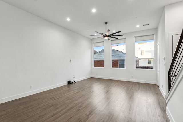 2912 Raleigh St Unit 102, Dallas, TX 75219 - interior space featuring recessed lighting, dark wood-style flooring, stairway, ceiling fan, and visible vents